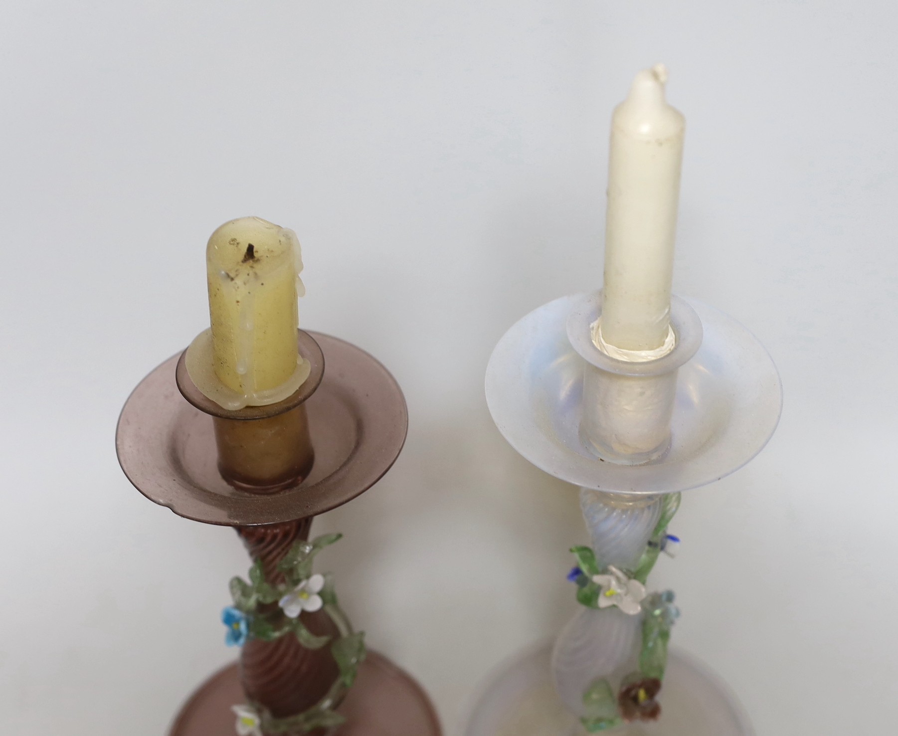 Two decorative Venetian glass candlesticks. Tallest 24cm